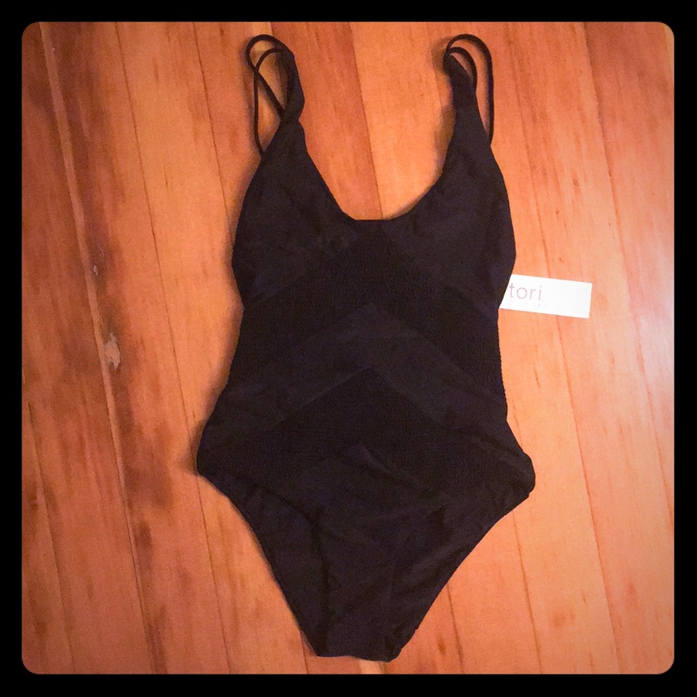 Black one piece swimsuit, never worn
